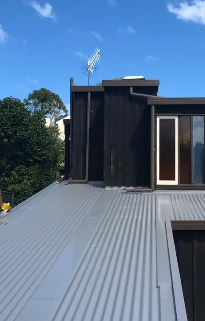 Full Iron Roof Replacement — after