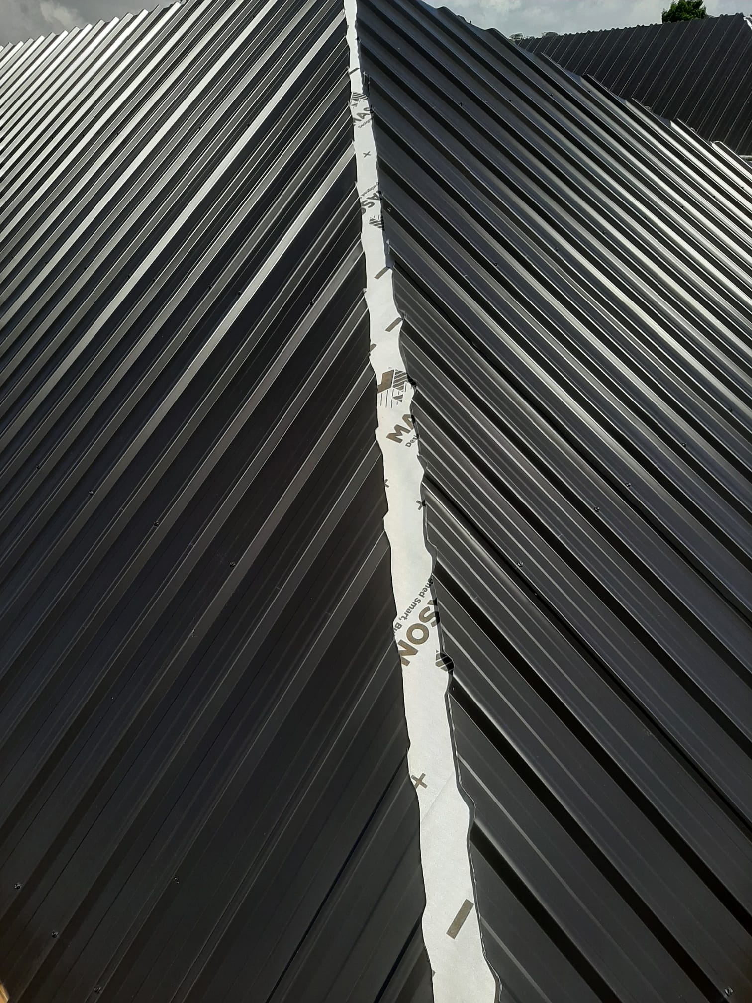 Coloursteel roof valley underlay membrane and flashing detail â€” Auckland