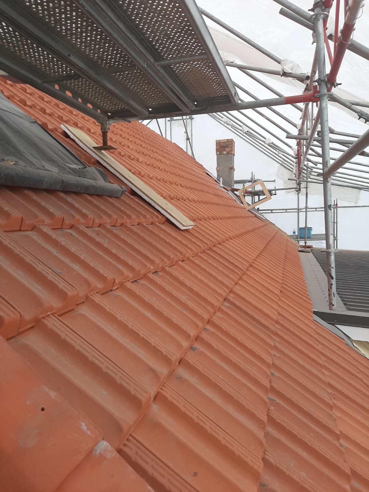 Matching obsolete terracotta roof tile profiles