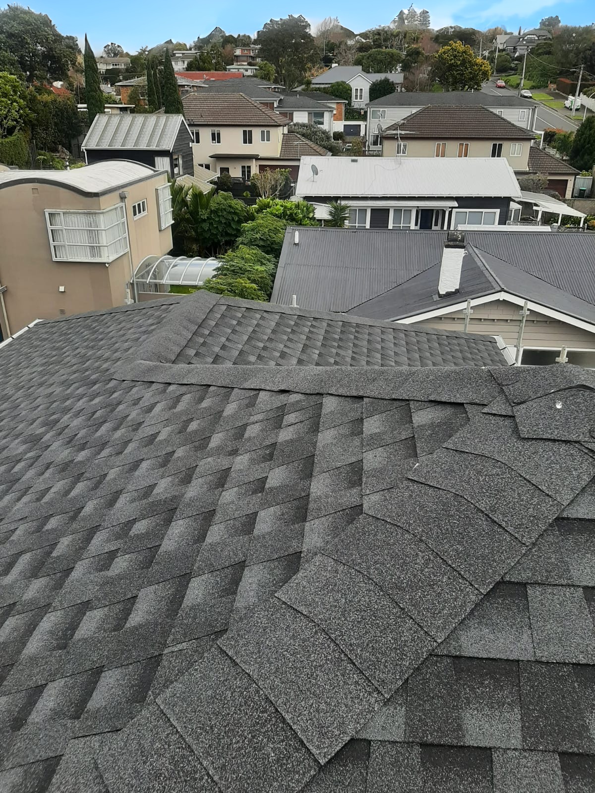 Auckland roof painting and restoration on terracotta tiles