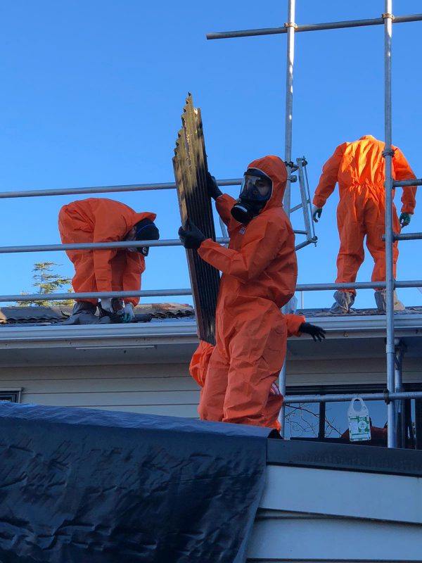 Roof repair experts working